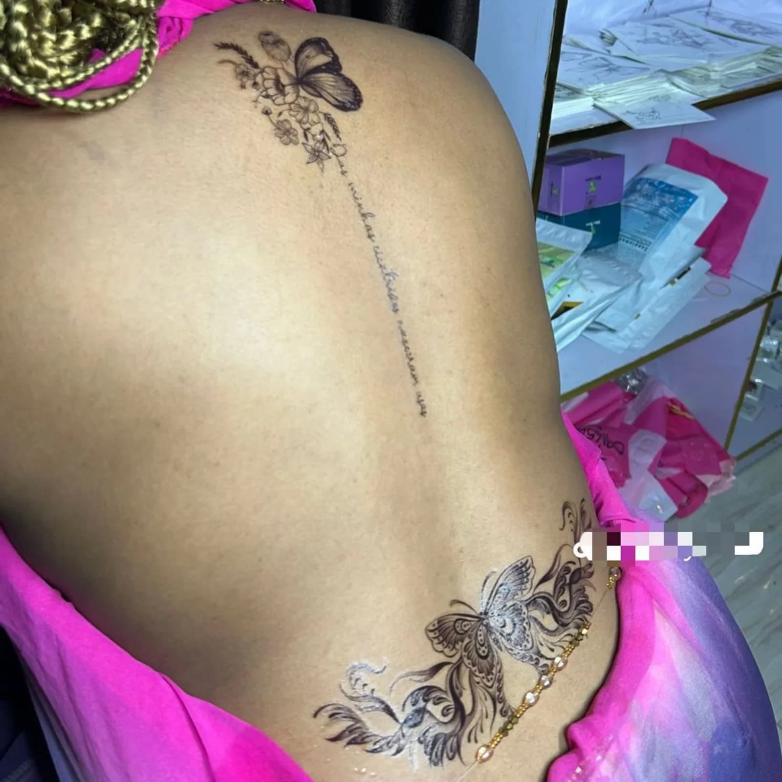 Waistline and spine tattoo combo